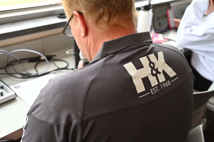 Back of an RUAC shirt, showing a logo placement below the collar