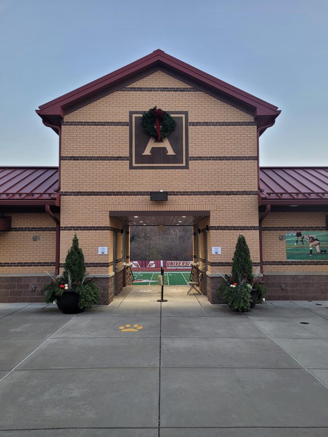 The stadium entrance at Alvernia University, where partner tables set up on match nights