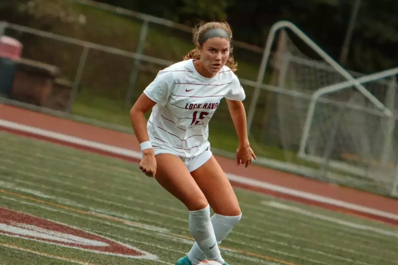 Brooke Gehret, in white No. 15, plays for Lock Haven University